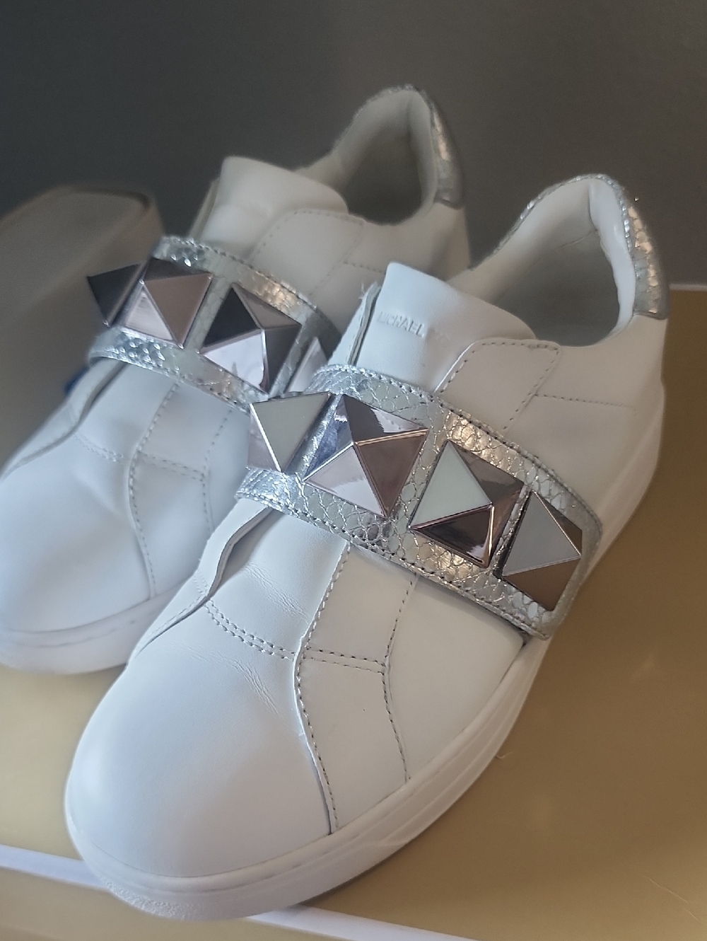 Michael Kors White Leather Slip-On Sneaker with Silver Pyramid Accent